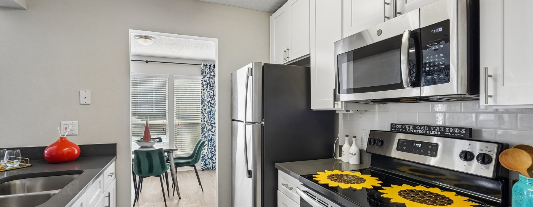 a kitchen with stainless steel appliances