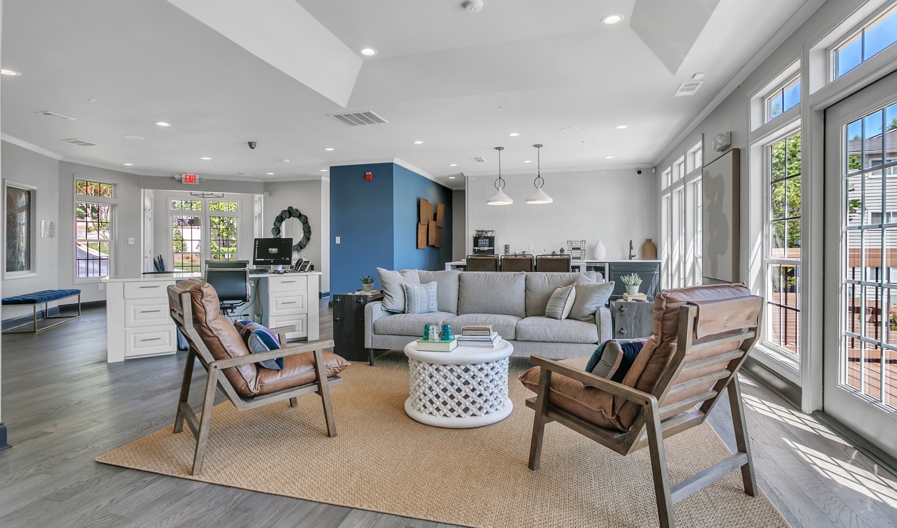 Resident-only amenity spaces Clubhouse with lounge seating and a kitchen