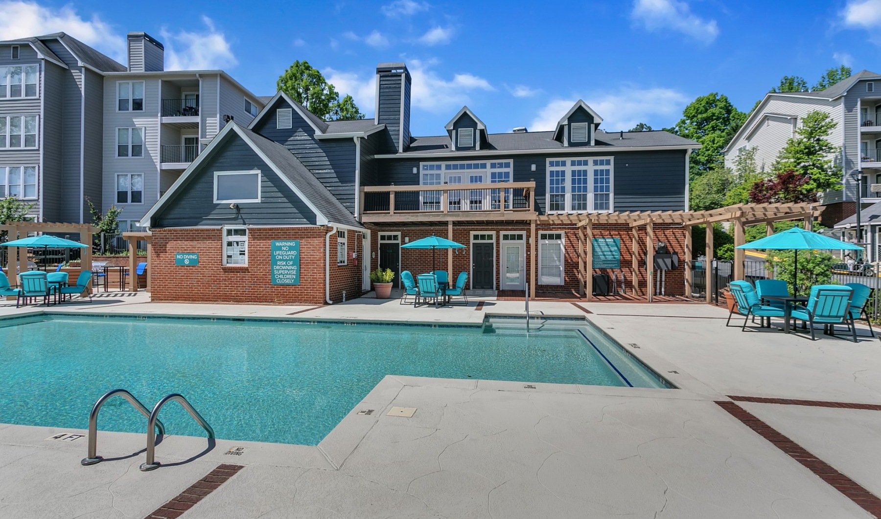 Relax poolside on our sundeck Swimming pool with sundeck